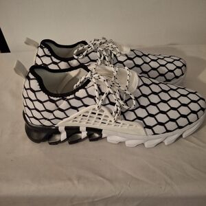 Men's Stylish Black and White Hexagon Pattern Sneakers.